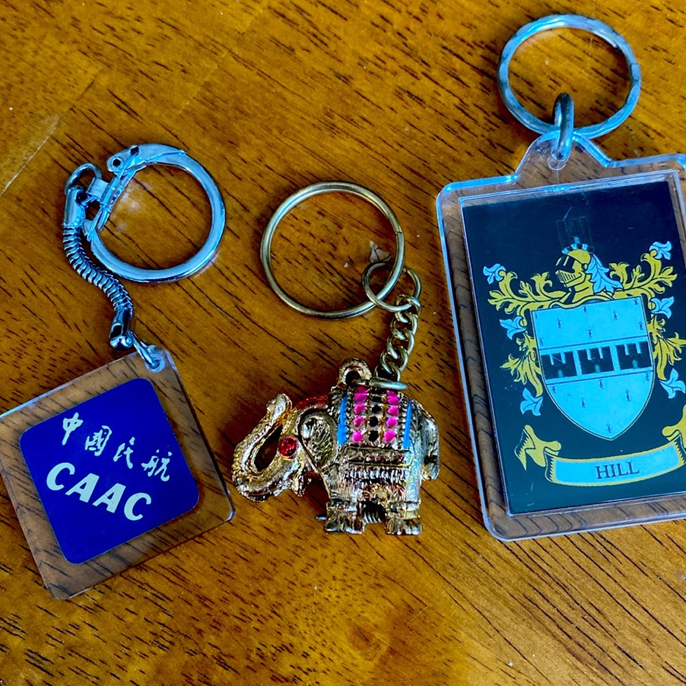 3 vintage keychains-CAAC Chinese Airlines, Hill, and gold Elephant